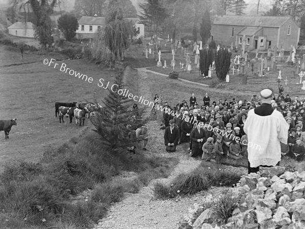 PRAYING FOR DEAD AT BALLYPOUSTA CEMETERY CANON HARMON & FR.T.COUNIHAN S.J.